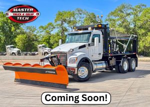 Kenworth T880S dump truck with snow plow setup